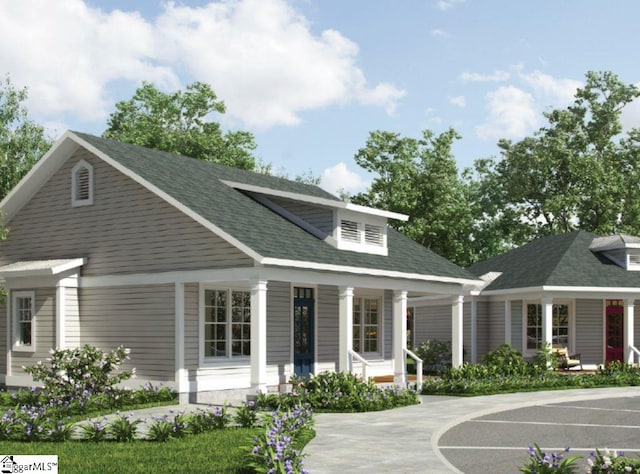 view of front of home featuring covered porch