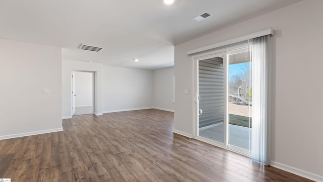 unfurnished room featuring hardwood / wood-style floors