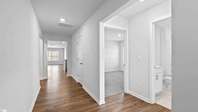 hall featuring dark hardwood / wood-style floors