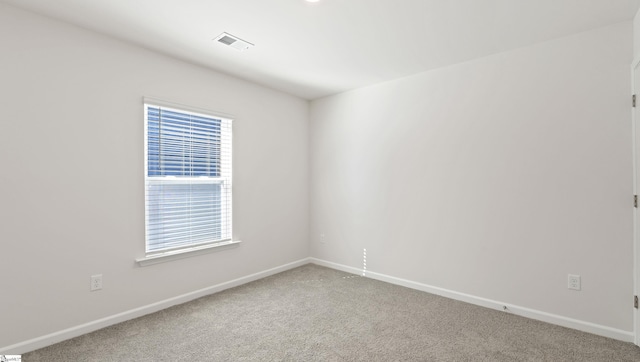 unfurnished room with carpet