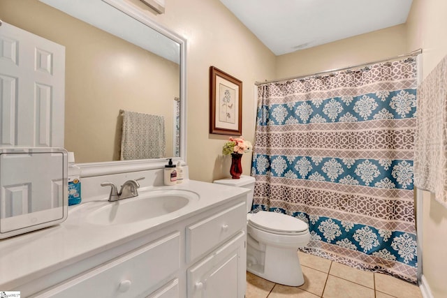 bathroom with walk in shower, tile patterned flooring, vanity, and toilet