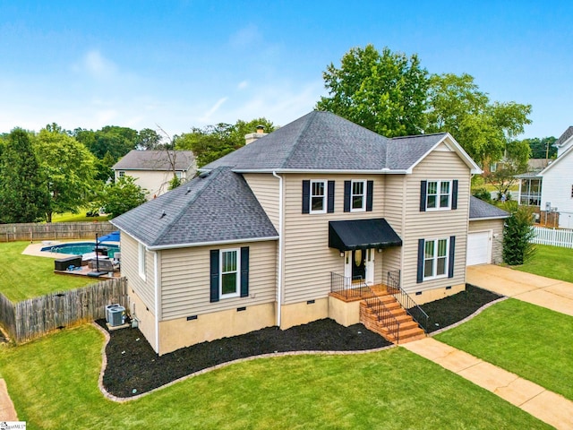 view of property with a front yard, a fenced in pool, and central AC unit