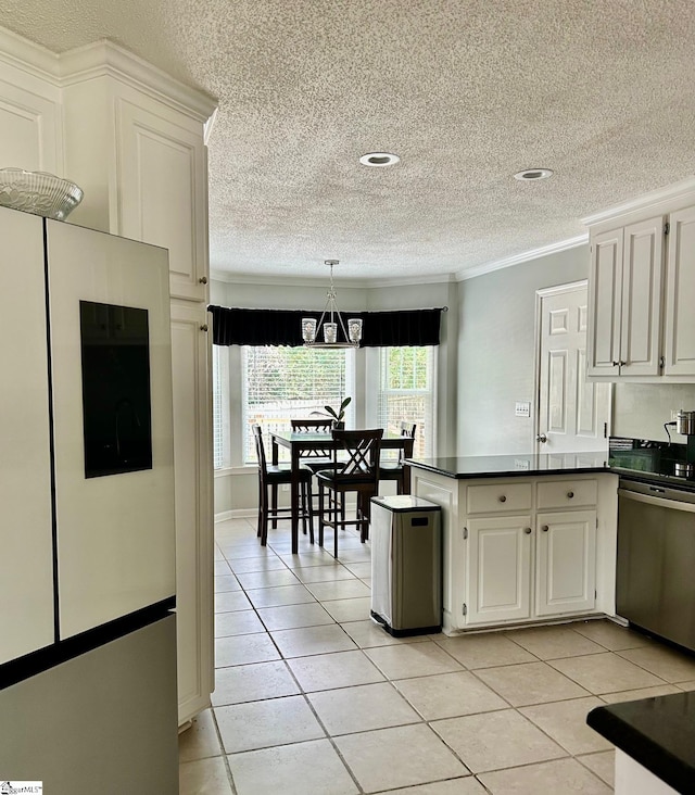 kitchen with white cabinets, dishwasher, ornamental molding, and kitchen peninsula