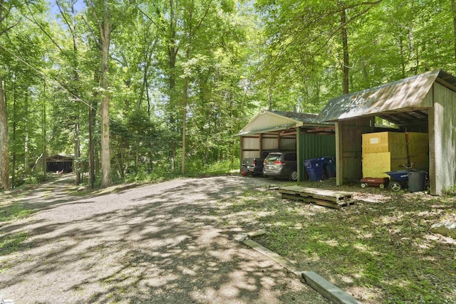 view of yard with a carport