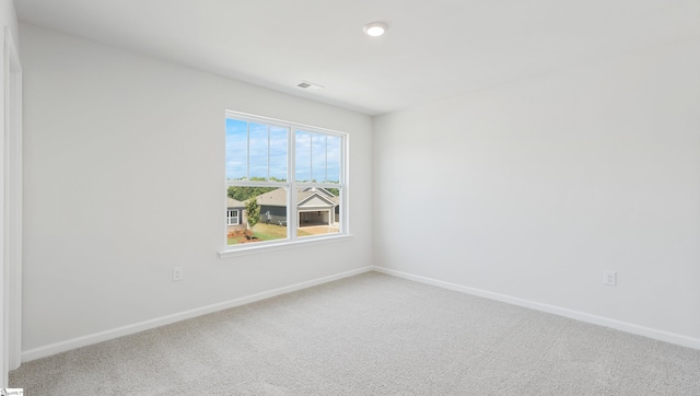 view of carpeted spare room