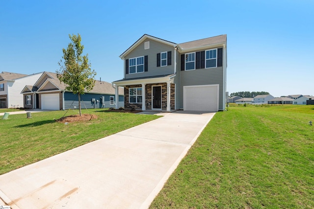 view of front of property featuring a porch, a front yard, and a garage