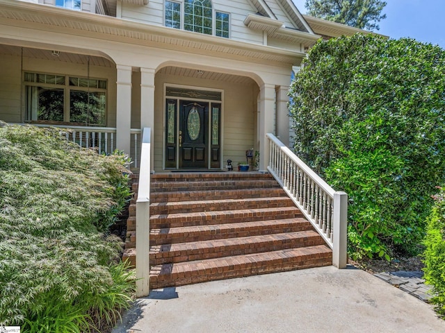 property entrance featuring a porch