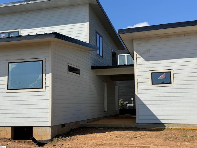 rear view of property with a patio area