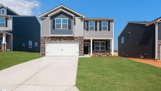 craftsman-style home with a garage and a front lawn