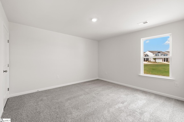 view of carpeted spare room