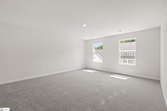 view of carpeted spare room