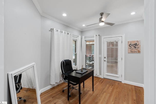 home office featuring crown molding, ceiling fan, and light hardwood / wood-style flooring