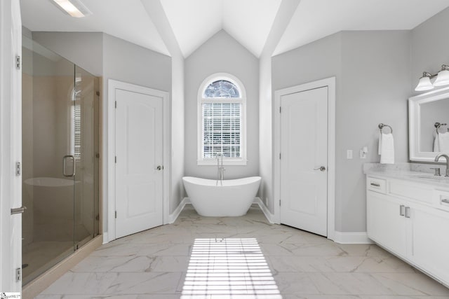 bathroom with vanity, vaulted ceiling, and shower with separate bathtub