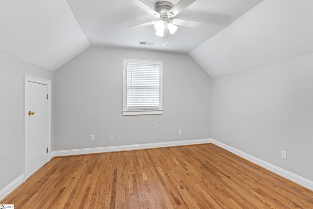 bonus room featuring lofted ceiling, ceiling fan, and light wood-type flooring