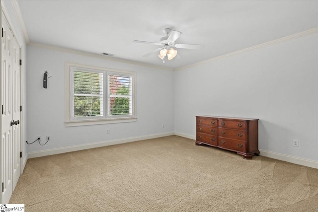 unfurnished bedroom featuring ceiling fan, a closet, and light carpet