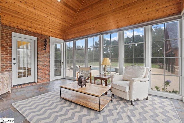 sunroom featuring wooden ceiling and lofted ceiling