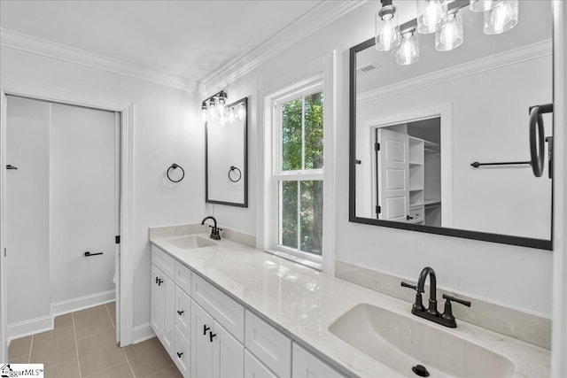 bathroom with crown molding, vanity, tile patterned floors, and toilet