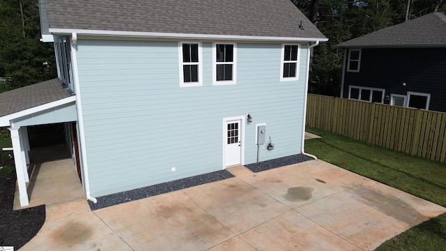 back of house with a patio area