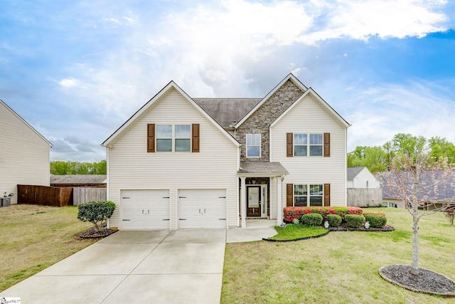 view of front facade with a front yard and a garage