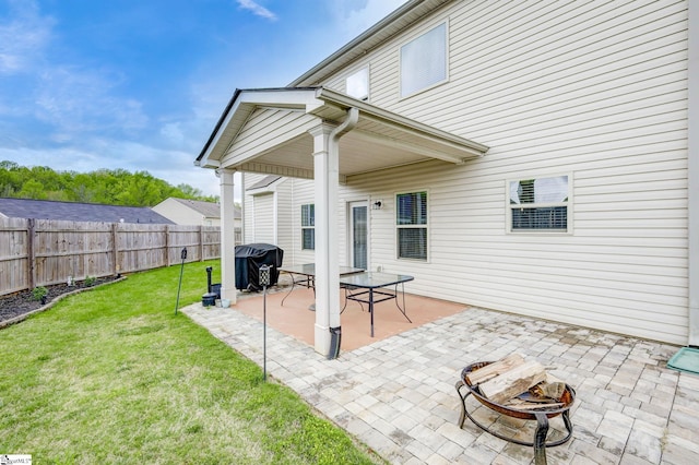 view of patio featuring an outdoor fire pit