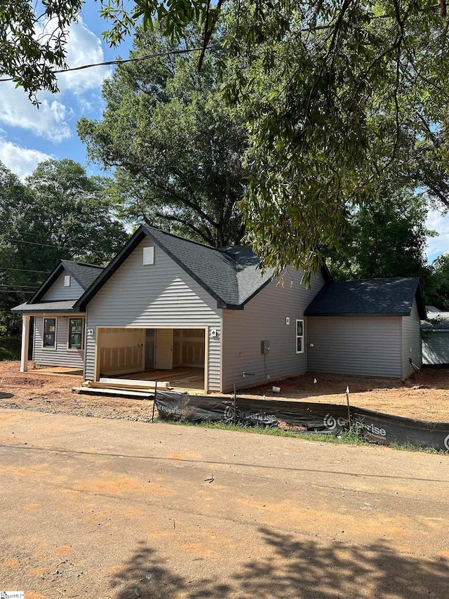 view of front of home with a garage