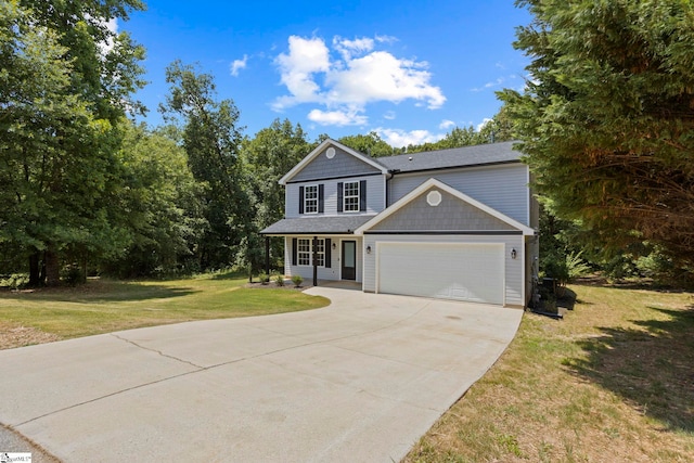 view of front facade featuring a garage and a front yard