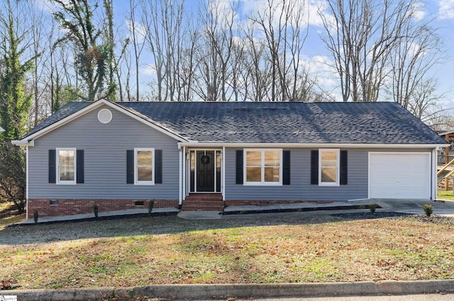 single story home featuring a garage and a front lawn