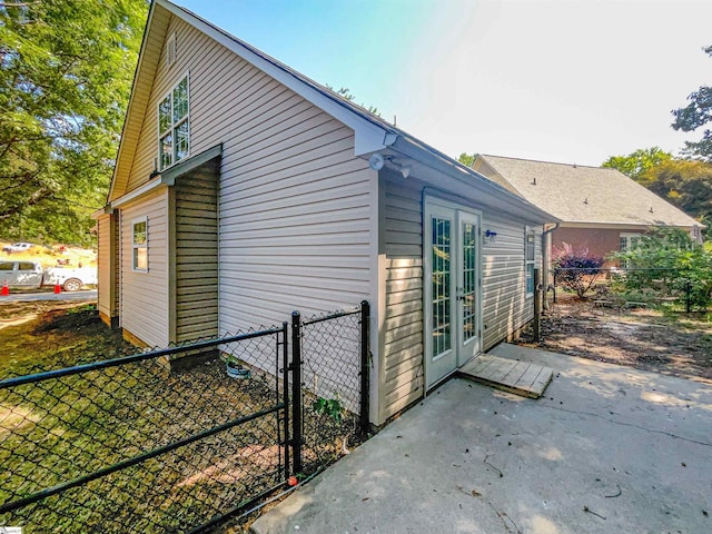 view of home's exterior with french doors