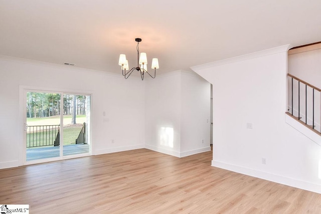 unfurnished room with a chandelier, light hardwood / wood-style flooring, and ornamental molding