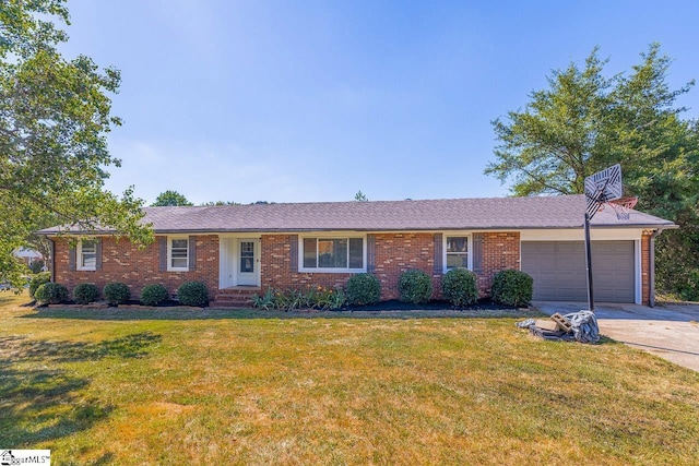 single story home featuring a garage and a front lawn