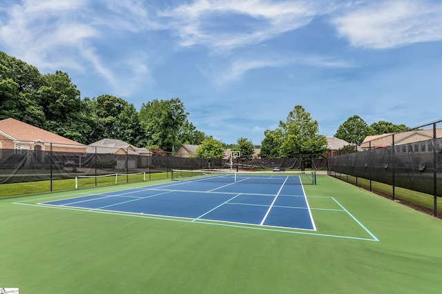 view of sport court featuring basketball hoop