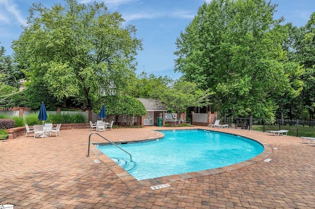 view of pool featuring a patio area