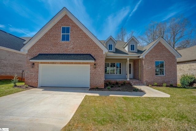 view of front of home with a garage and a front yard