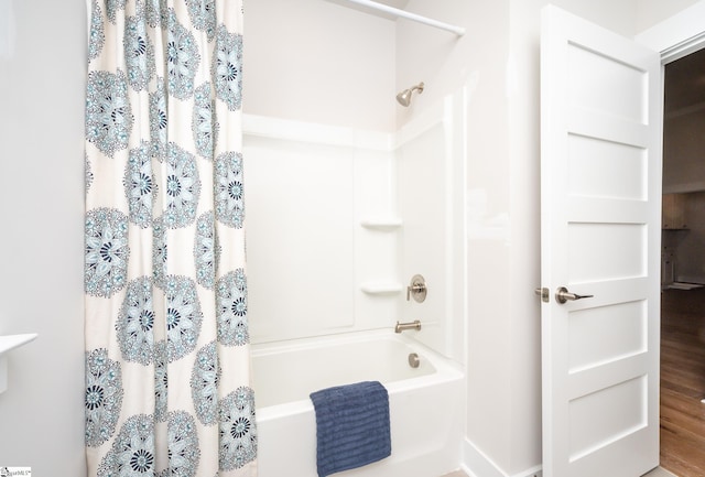 bathroom featuring shower / bath combination with curtain