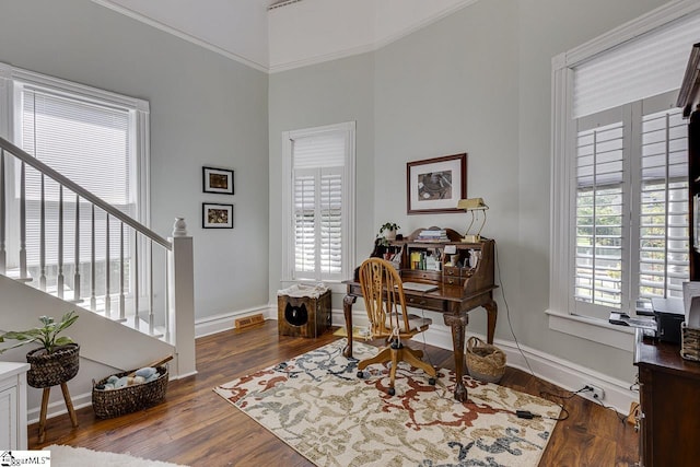 office space with wood-type flooring