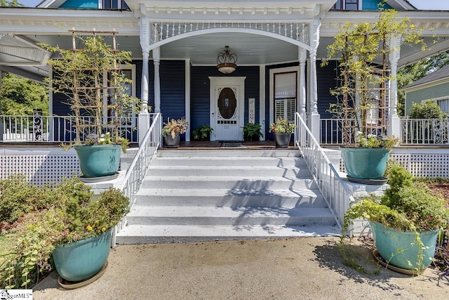 entrance to property with a porch