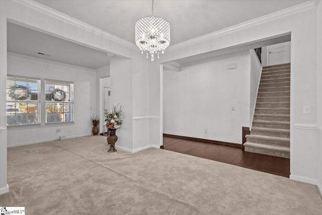 interior space with ornamental molding and a notable chandelier