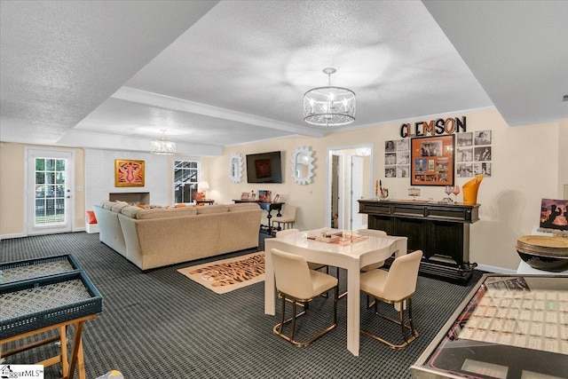 carpeted dining room with a textured ceiling and a notable chandelier