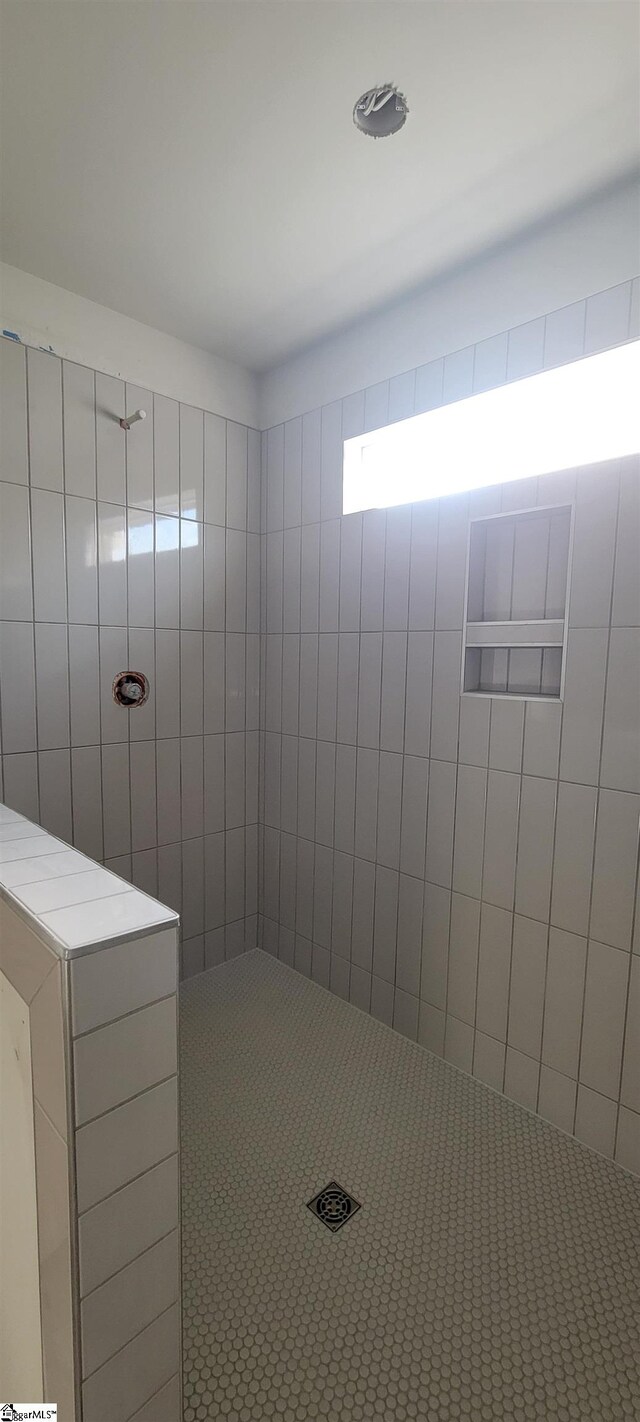 bathroom with walk in shower