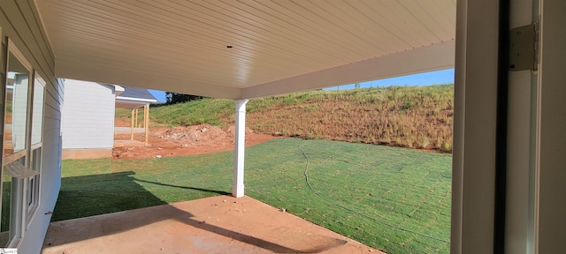 view of yard with a patio area