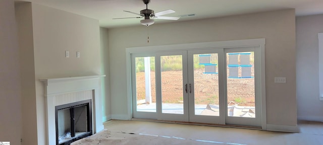 doorway with ceiling fan