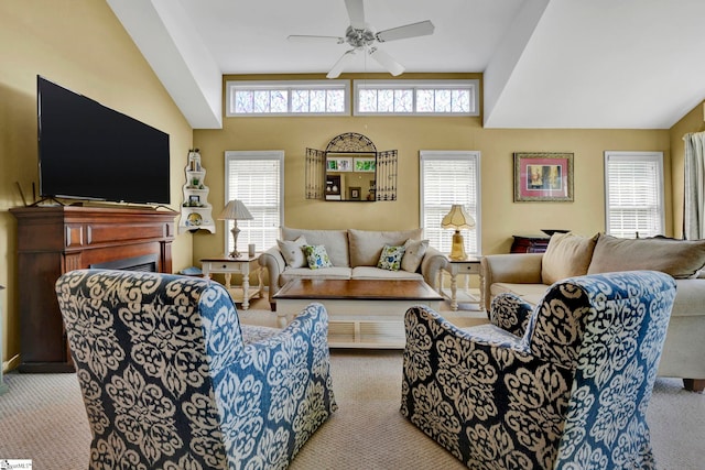 living room featuring a wealth of natural light, light colored carpet, and ceiling fan