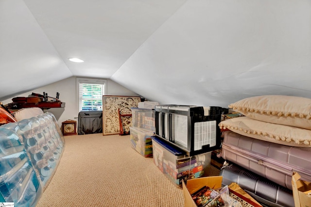 carpeted bedroom featuring vaulted ceiling