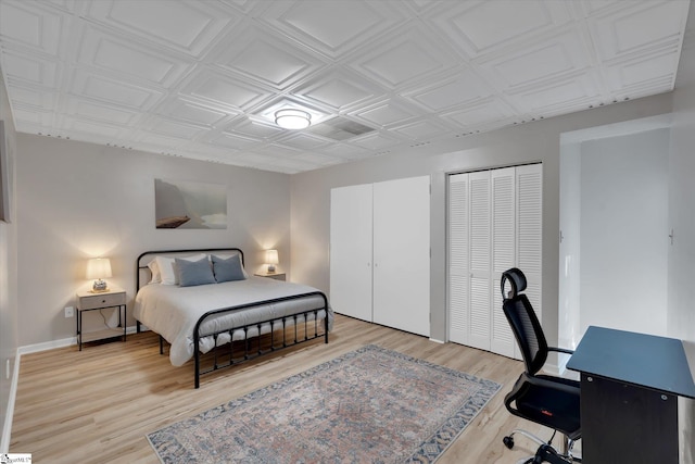 bedroom with wood-type flooring