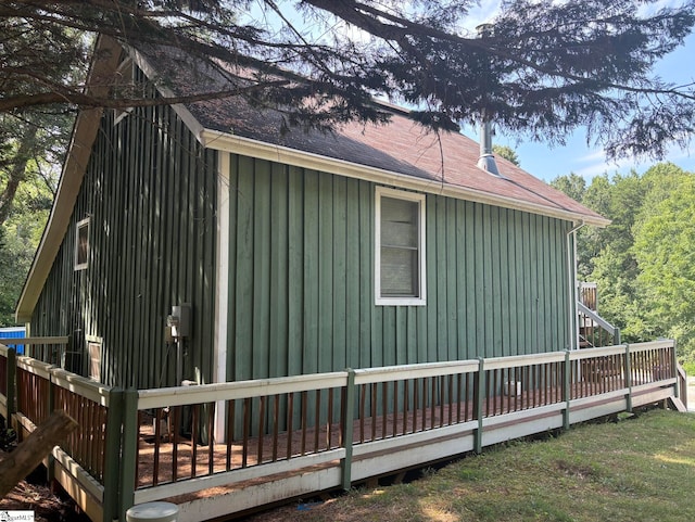 view of home's exterior featuring a deck