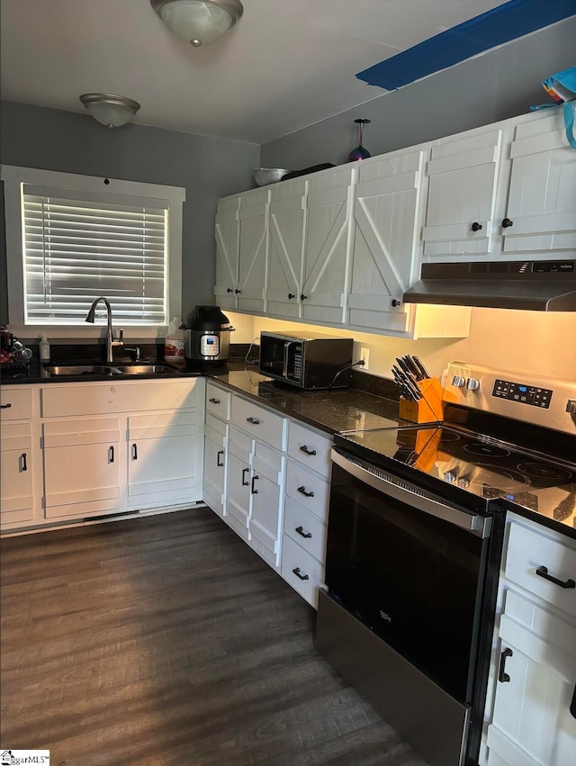 kitchen featuring white cabinets, stainless steel electric range, dark hardwood / wood-style flooring, and sink