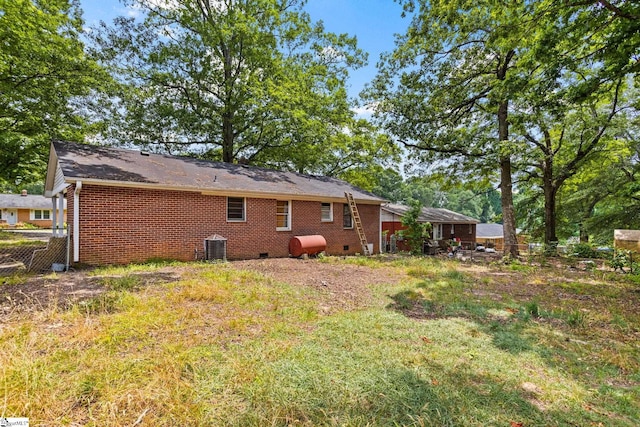 back of property with central air condition unit