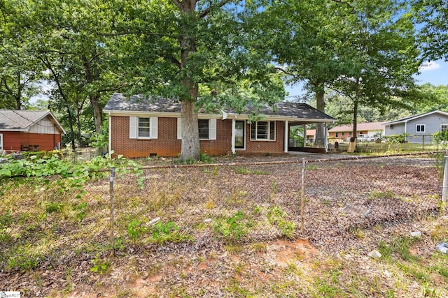 single story home with a carport