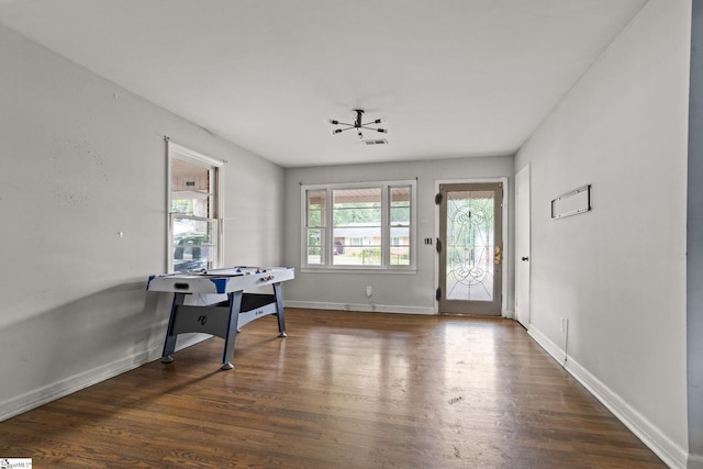 dining area featuring dark wood-type flooring