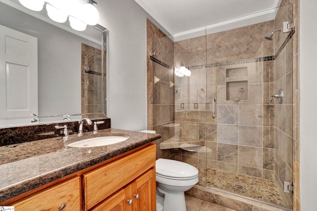 full bathroom with toilet, tile patterned floors, a shower stall, and vanity